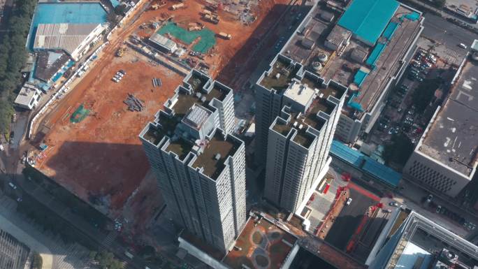 4k航拍，深圳一个高楼的楼顶和旁边的建设