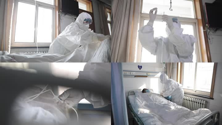 武汉疫情身穿防护服白衣天使护士照顾患者