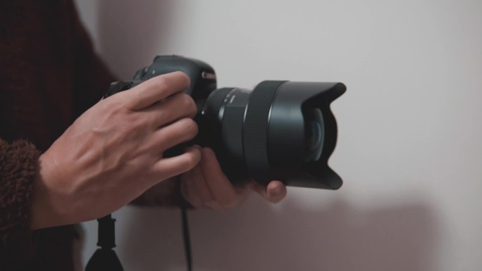 单反相机佳能单反相机数码相机拿相机