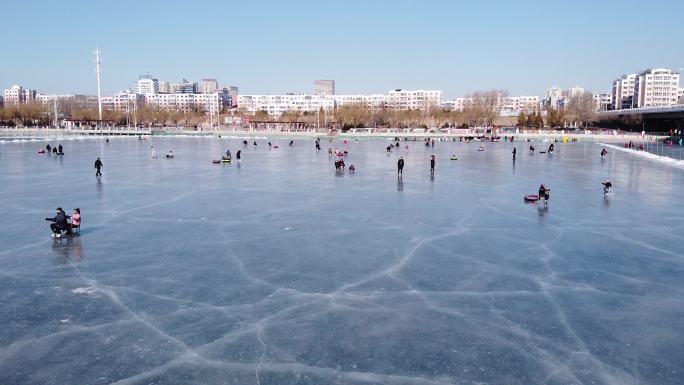 冬天滑冰滑雪轮滑冰面航拍超清视频素材