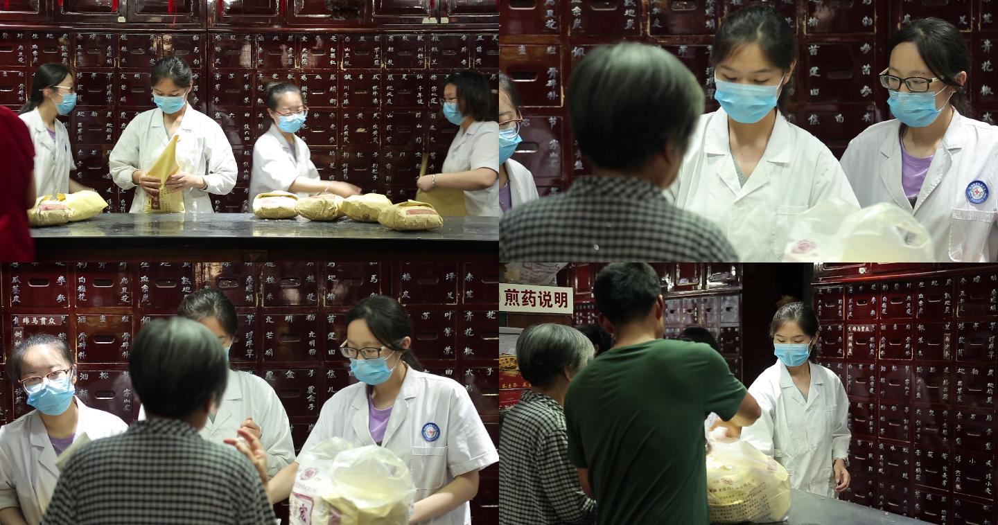 55中医馆抓药的人配药的中药师柜台