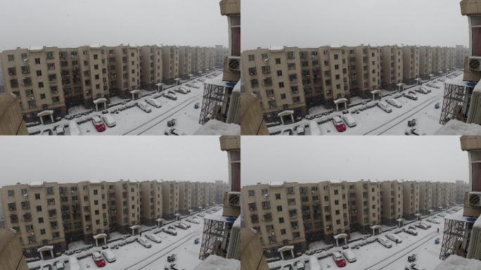 寒冬小区高楼雪景下雪