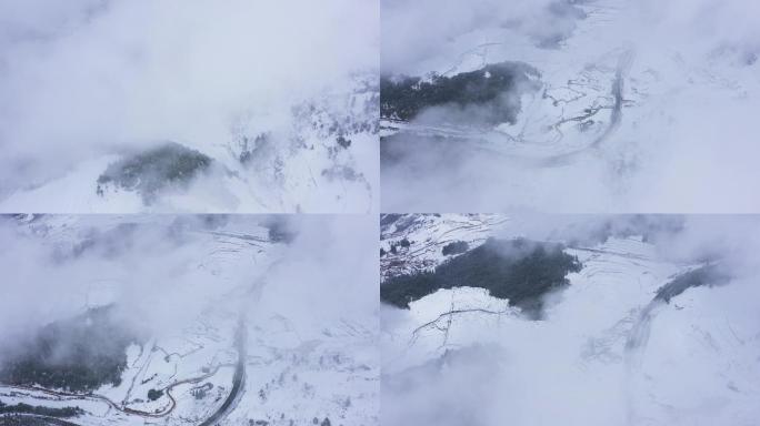 寒冬雪地视频冬天云雾下乡村雪景空荡荡公路