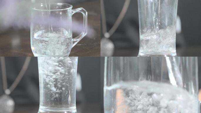 倒水的镜头水倒进杯子里