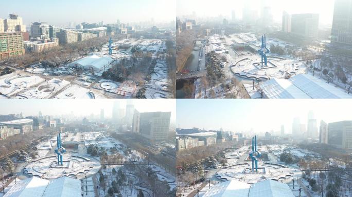 4K未调色最新泉城广场雪景航拍长视频