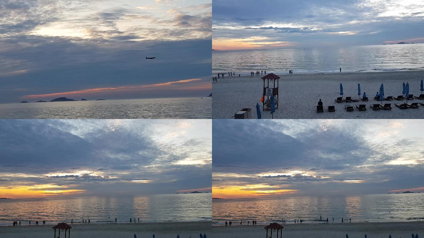 日落夕阳越南海边沙滩飞机起飞