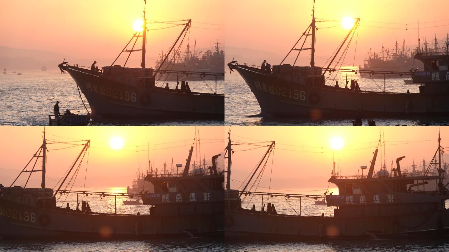 海边渔港出海归来海洋渔业捕捞落日夕阳