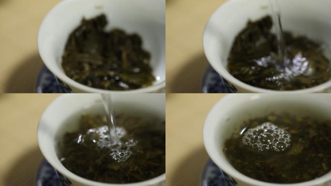 往杯子里倒茶水