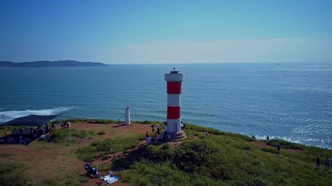 4K航拍海岛海岸线灯塔