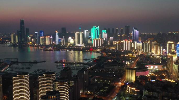 4K航拍青岛城市天际灯光秀点亮瞬间长镜头