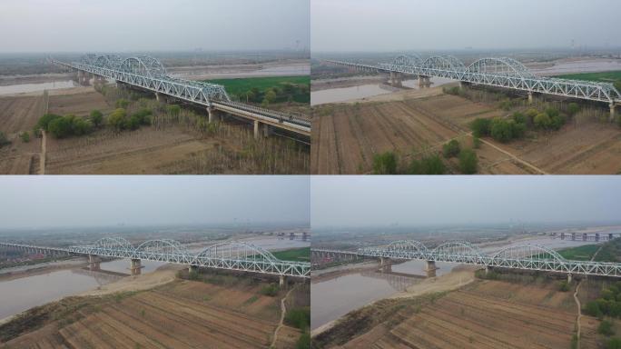 航拍春天的京沪高速铁路济南黄河特大桥