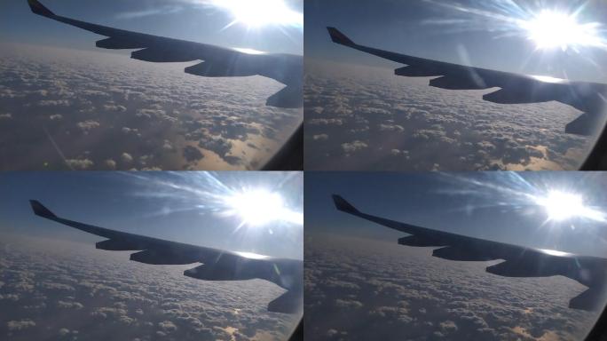 高清云层之上飞机俯视大海素材