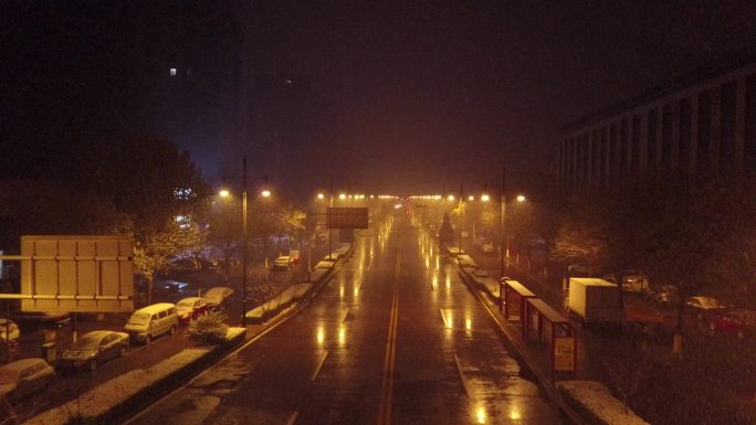 唐山雨雪天城市街道夜景航拍