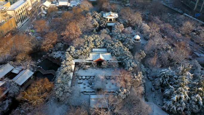 山东济南趵突泉冬雪景航拍4K