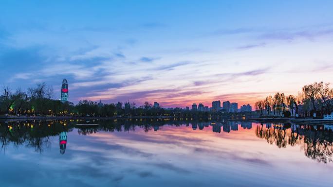 济南大明湖落日绿地中心大厦夜景延时4K