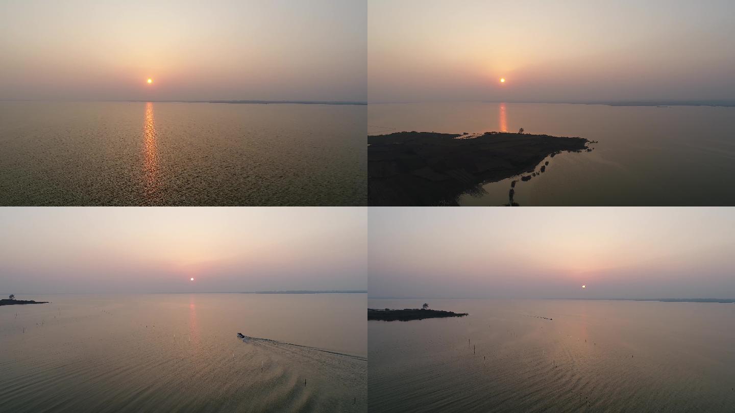 航拍4K-清晨阳光湖光渔船划过水面