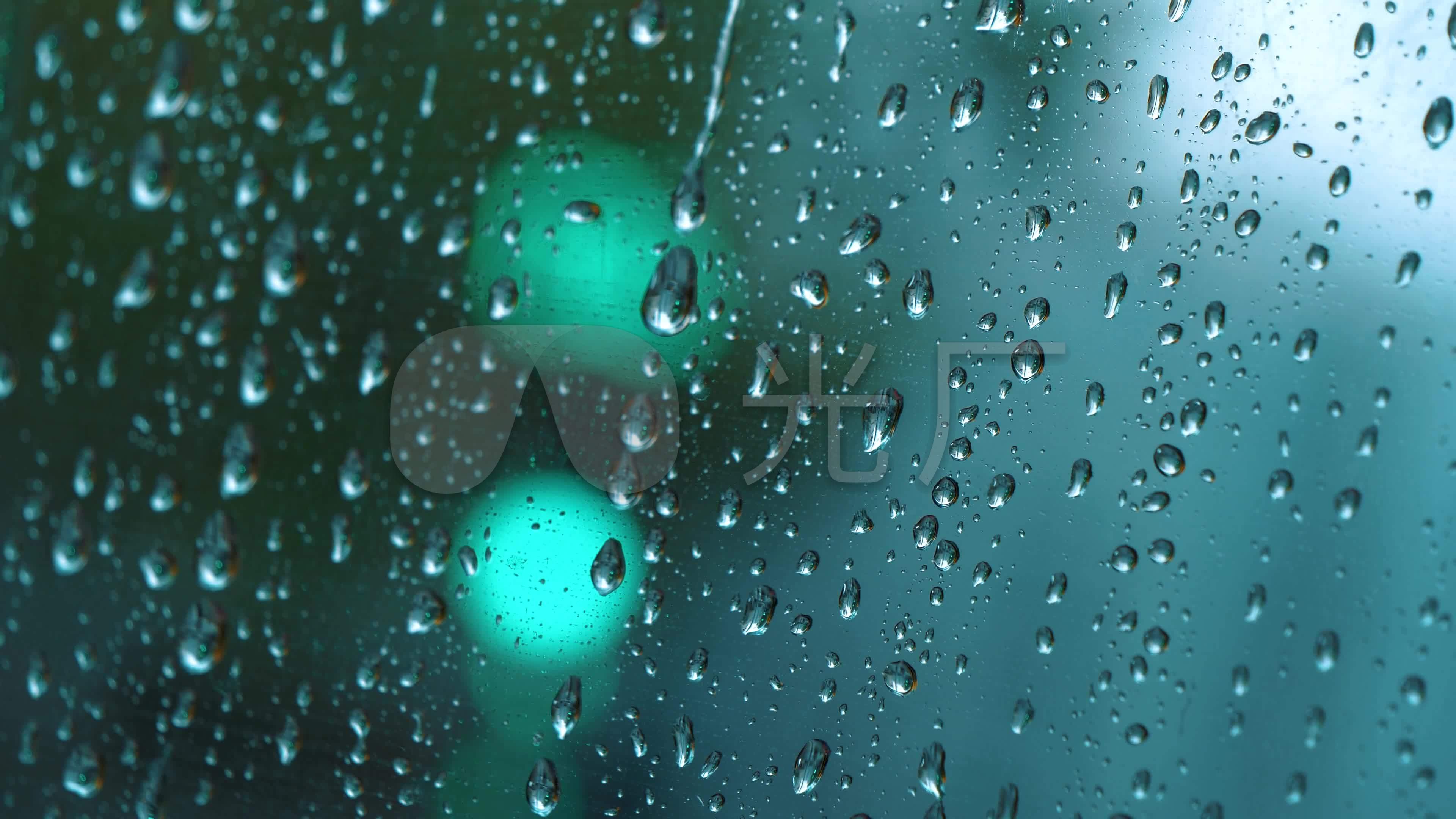 雨滴落在玻璃上的唯美手机壁纸图片_配图网