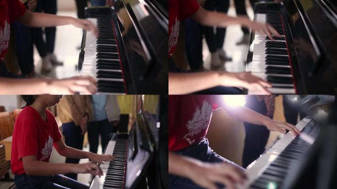 中学生练习弹钢琴