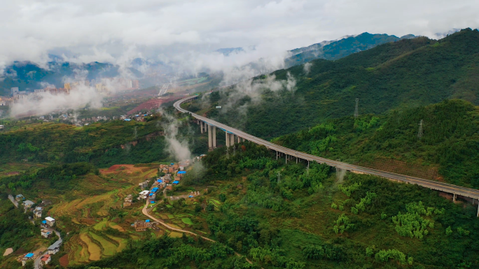 山间高速公路村落云海航拍大景