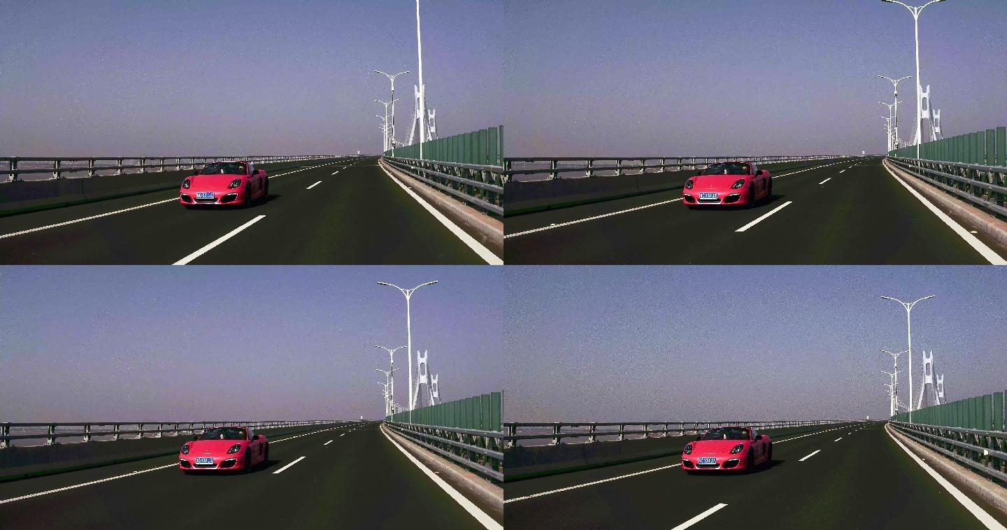 大桥跨海跨江红色跑车美女