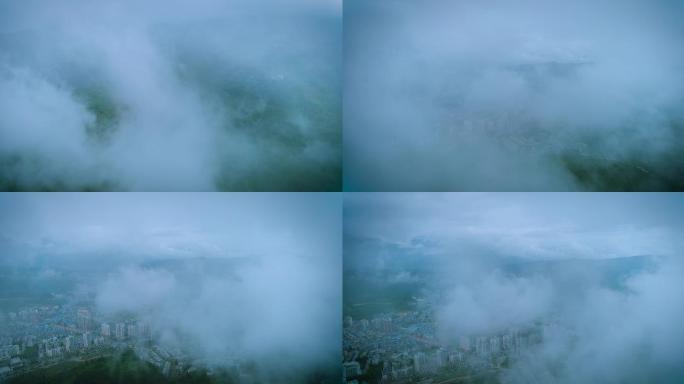 4k航拍云雾中的美丽城市
