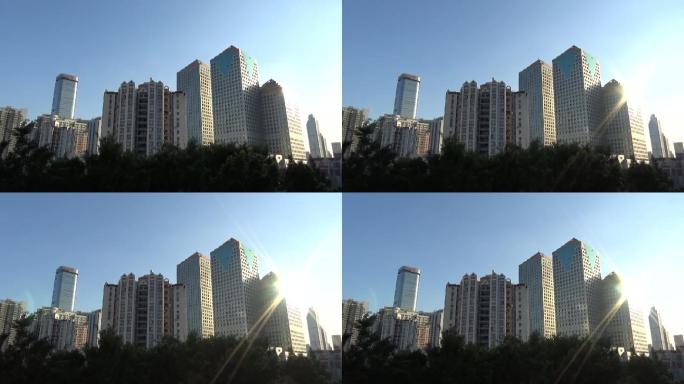 实拍广州夏天天河闹市夕阳西下玻璃幕墙阳光