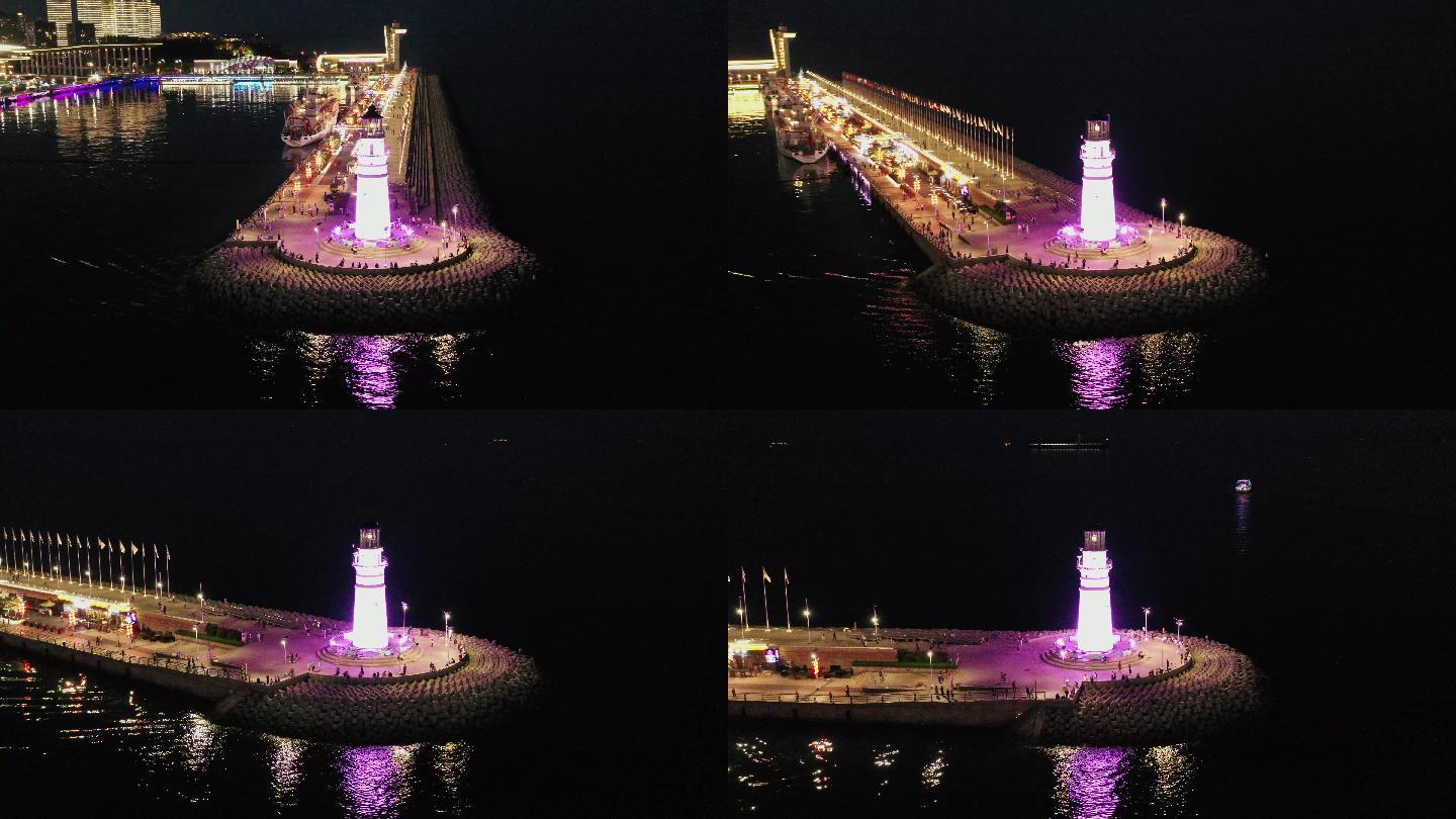 航拍青岛海边的灯塔夜景