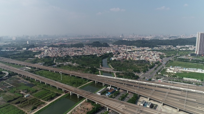 4K航拍高铁行驶在广州南站外高架桥上