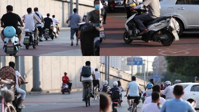 早晨北京街道夏日城市上班人群骑车