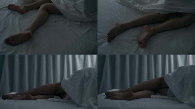 美女睡在床上，腿部特写细节4k视频素材