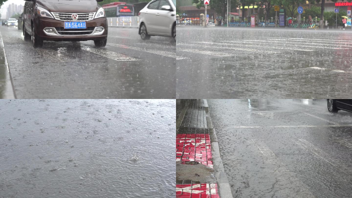 城市街头暴雨车辆驶过溅起水花