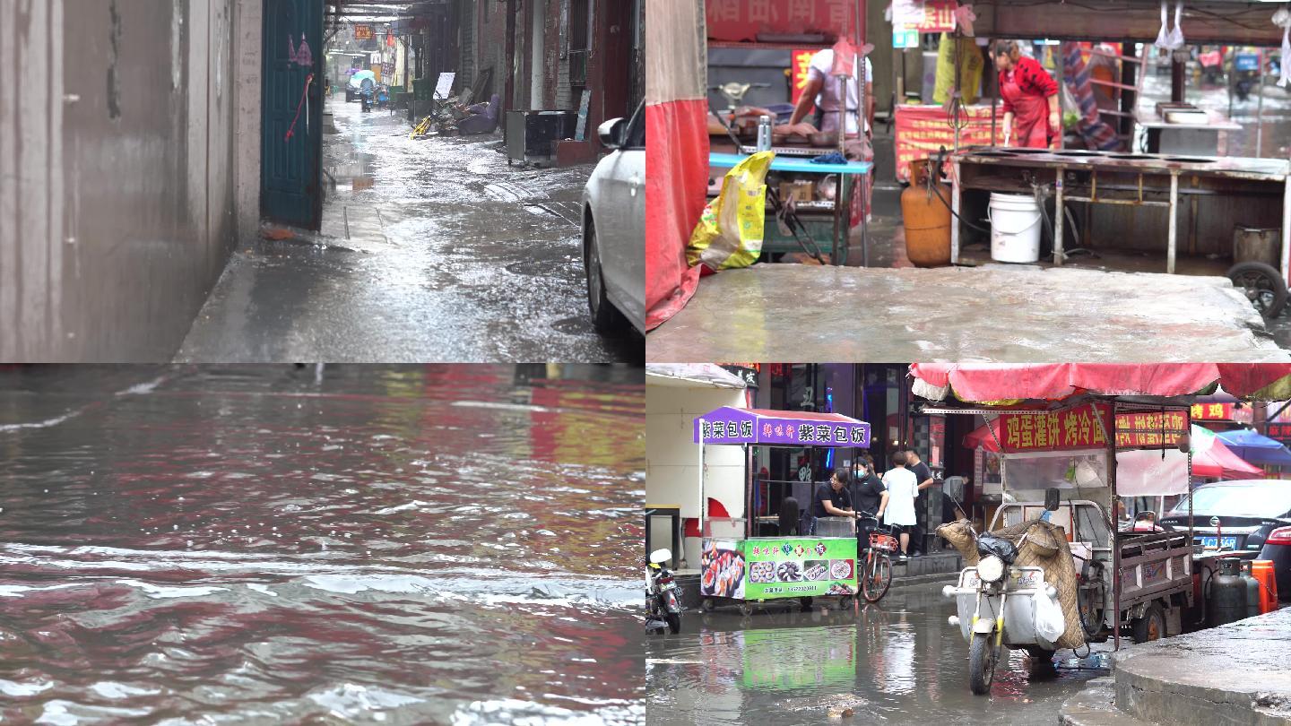 城中村下雨后小巷子街道泥泞水淹马路忙碌居