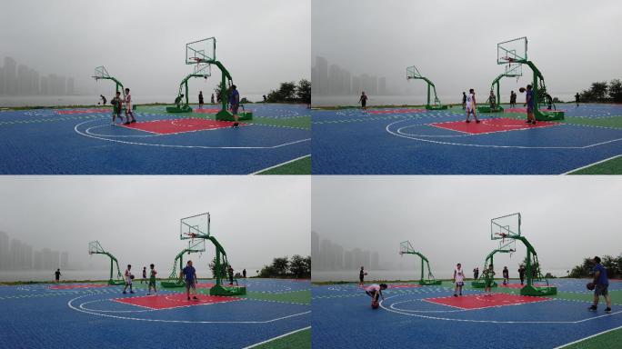 清晨江边打篮球健身