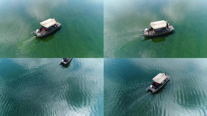 清澈的湖面游客坐船拍照游玩航拍
