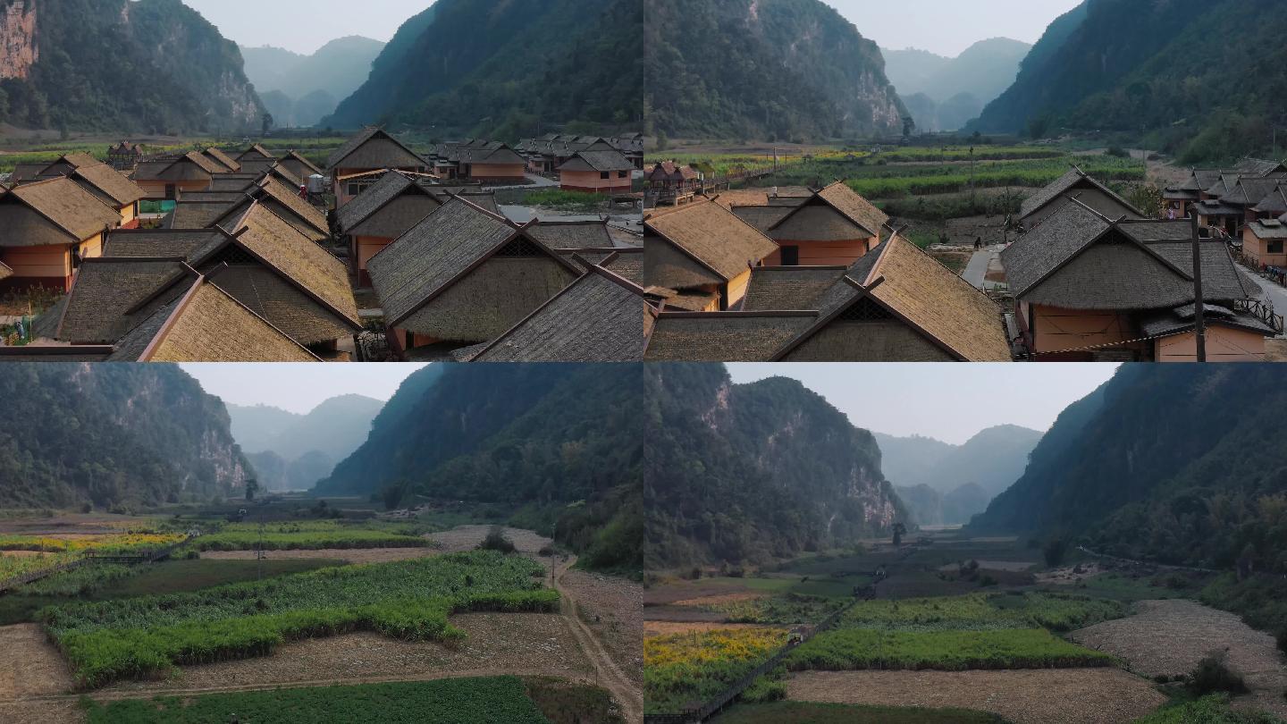 佤族村寨视频云南临沧沧源民族村庄的茅草屋