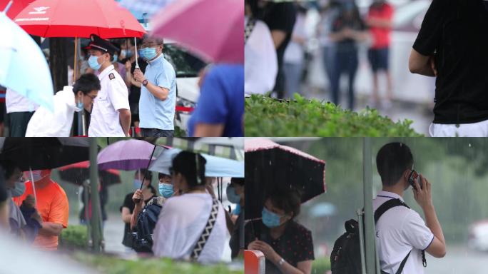 北京高考加油，雨天考场外等待家长