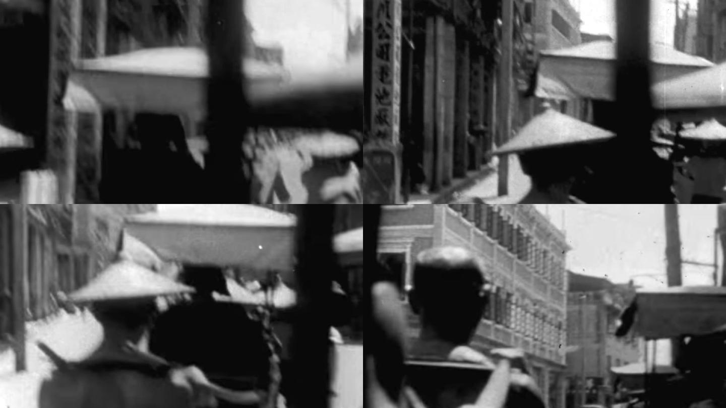 30年代城市街道马路行人轿夫抬轿子