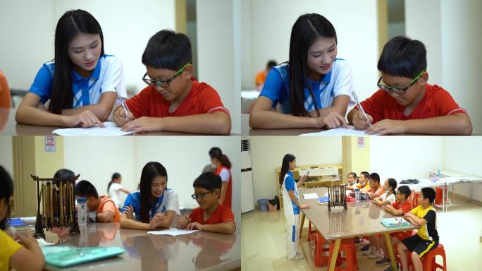 美女参加志愿者服务辅导小学生写作业