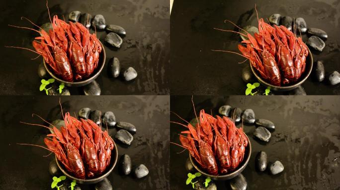 黑色石板上的一碗红色小龙虾