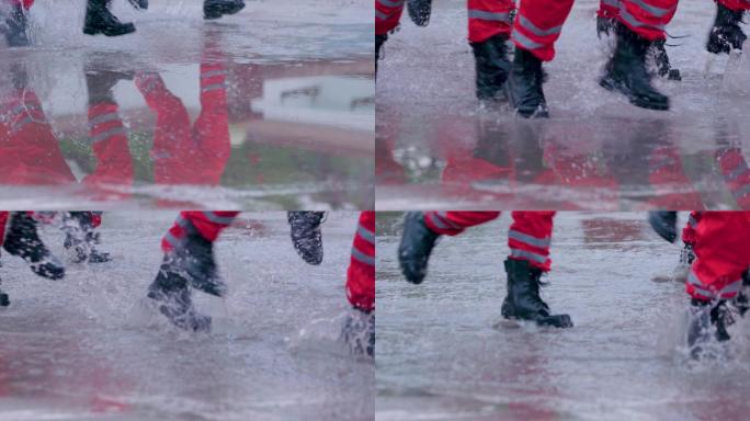 搜救队员从水中跑过的脚步特写慢镜头
