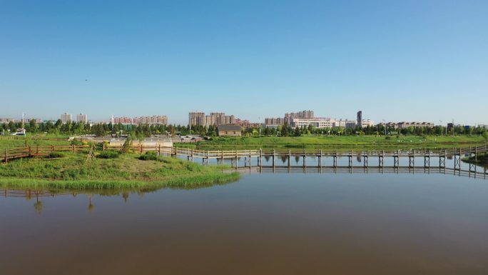 锡林浩特市湿地公园夏季清晨水天一色航拍