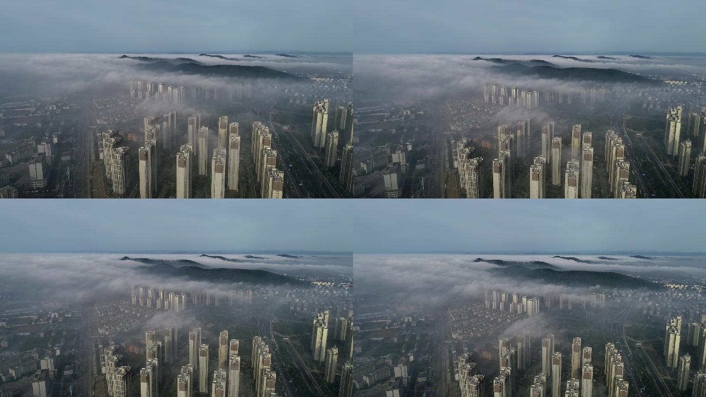 航拍襄阳城市上空平流雾涌动如仙境
