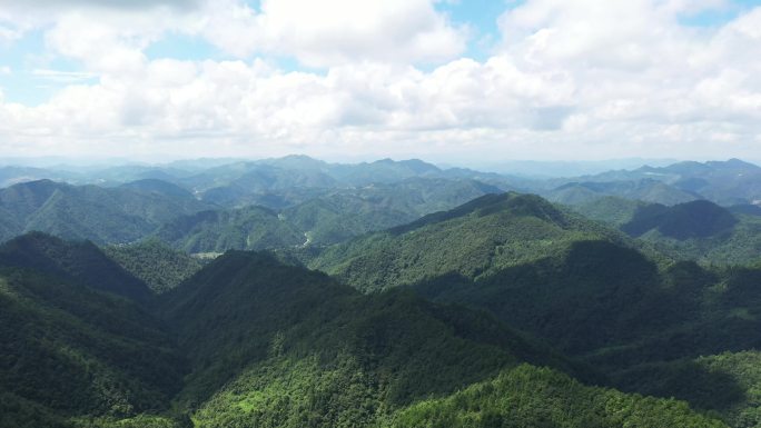 4K航拍秀地深山蓝天白云松明方向素材