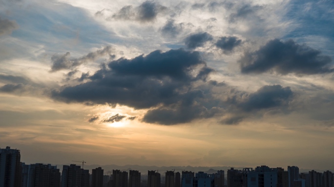 城市天空夕阳乌云变化遮日4K