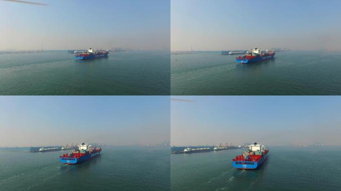 天港口货轮装载集装箱出海贸易往来经济发展
