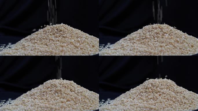 高清升格拍摄糙米大米掉落米堆镜头