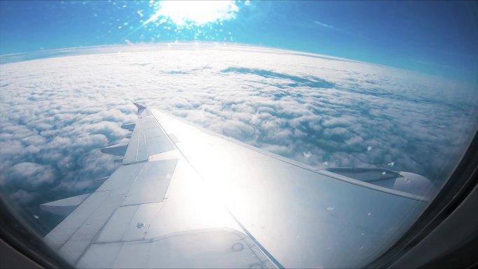 飞机窗外天空云彩空中乘机旅行机翼飞机