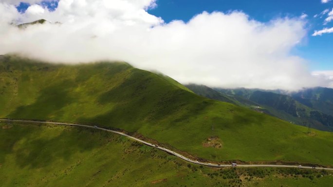 航拍4K穿行在大山中的公路