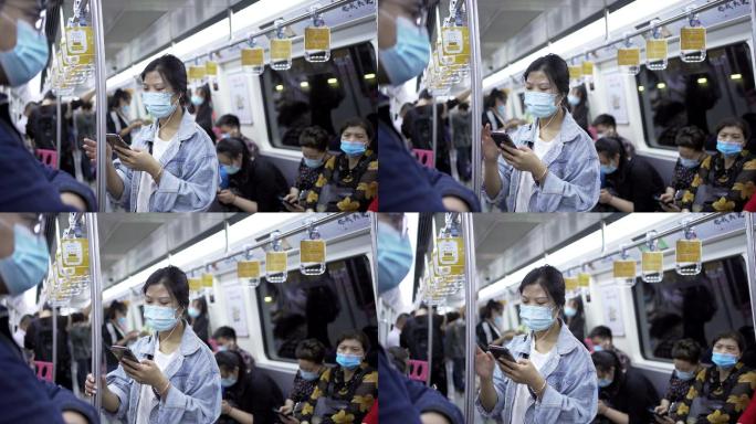 高铁轻轨动车乘客玩手机游客市民戴口罩出行
