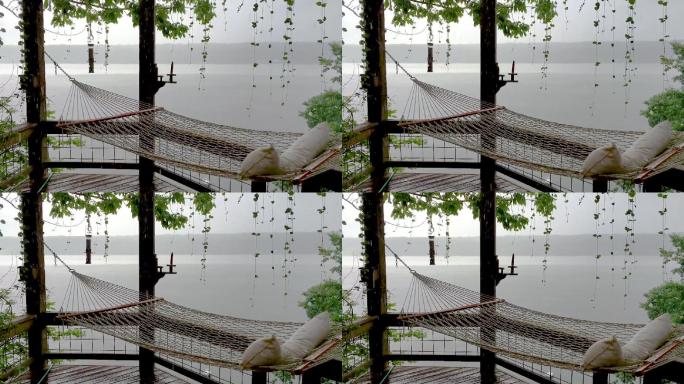湖边雨天休闲吊床